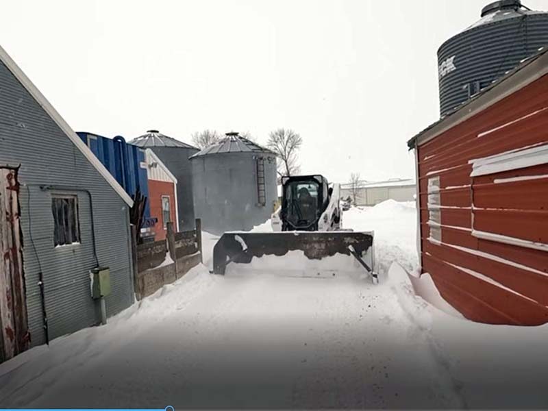 plowing snow at Larson Farms